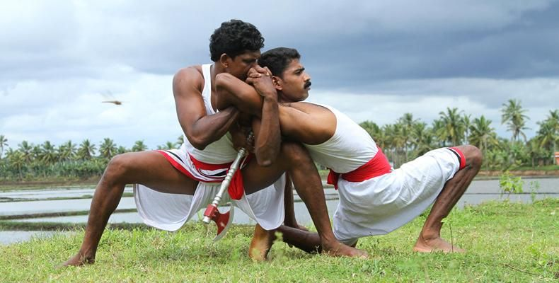 Kalaripayattu grappling outdoors